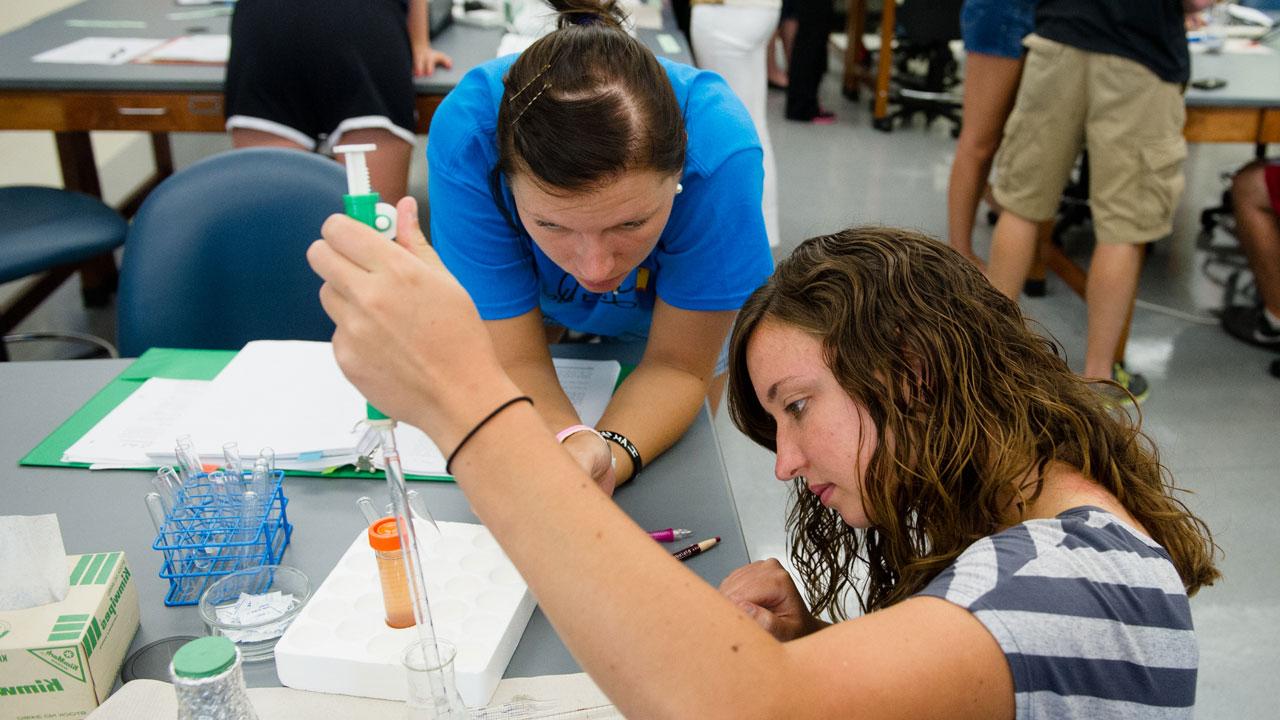 Health pre-professional students in lab