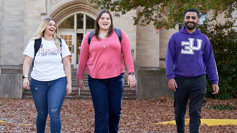 Brook walking with other students